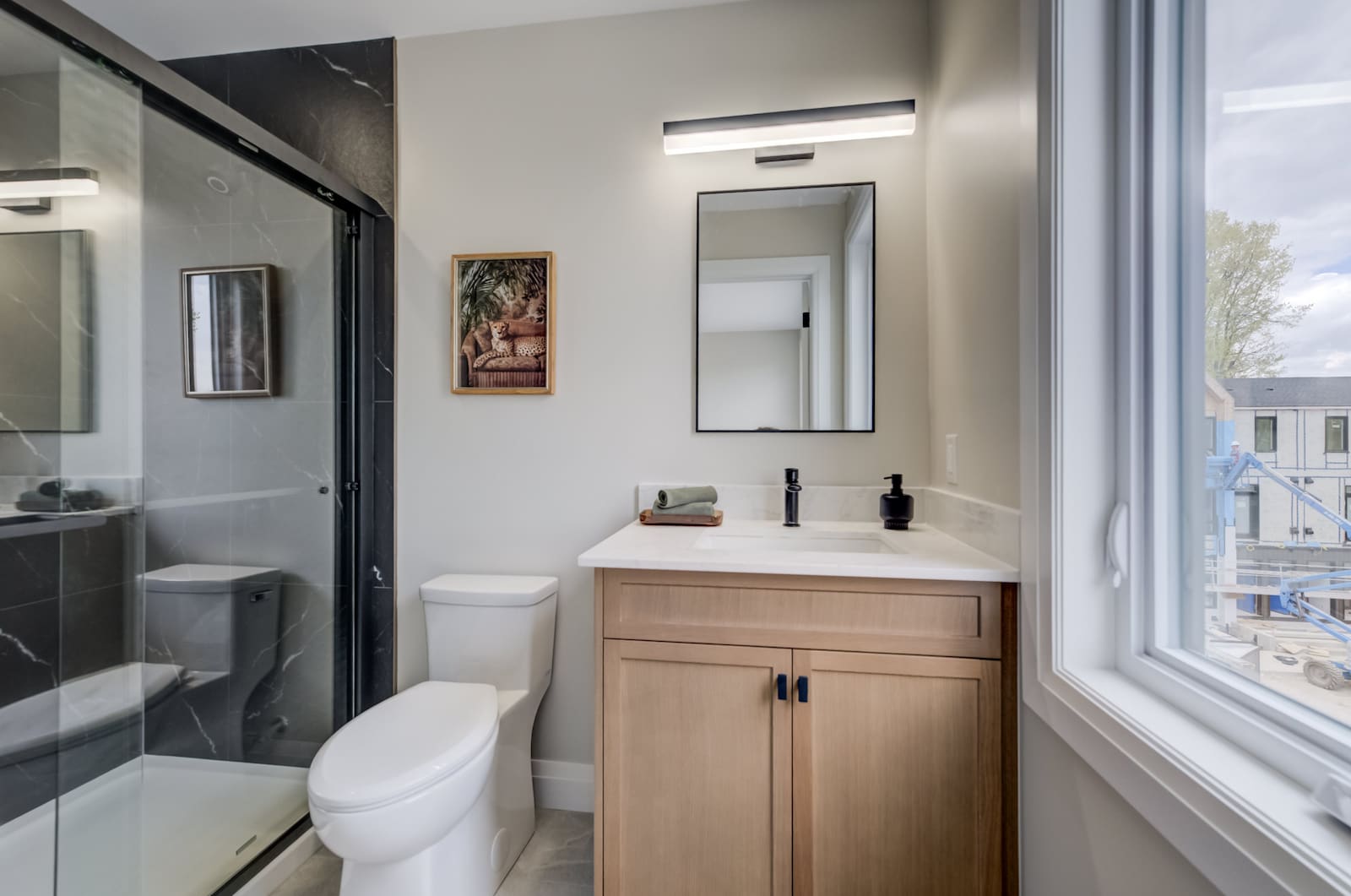 Modern bathroom finish at Haravale Towns with quartz and tiled details
